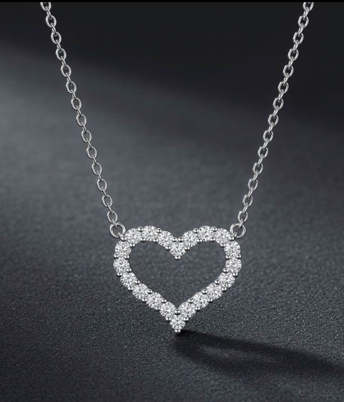 1 CTW diamond open heart pendant on 18K white gold cable chain