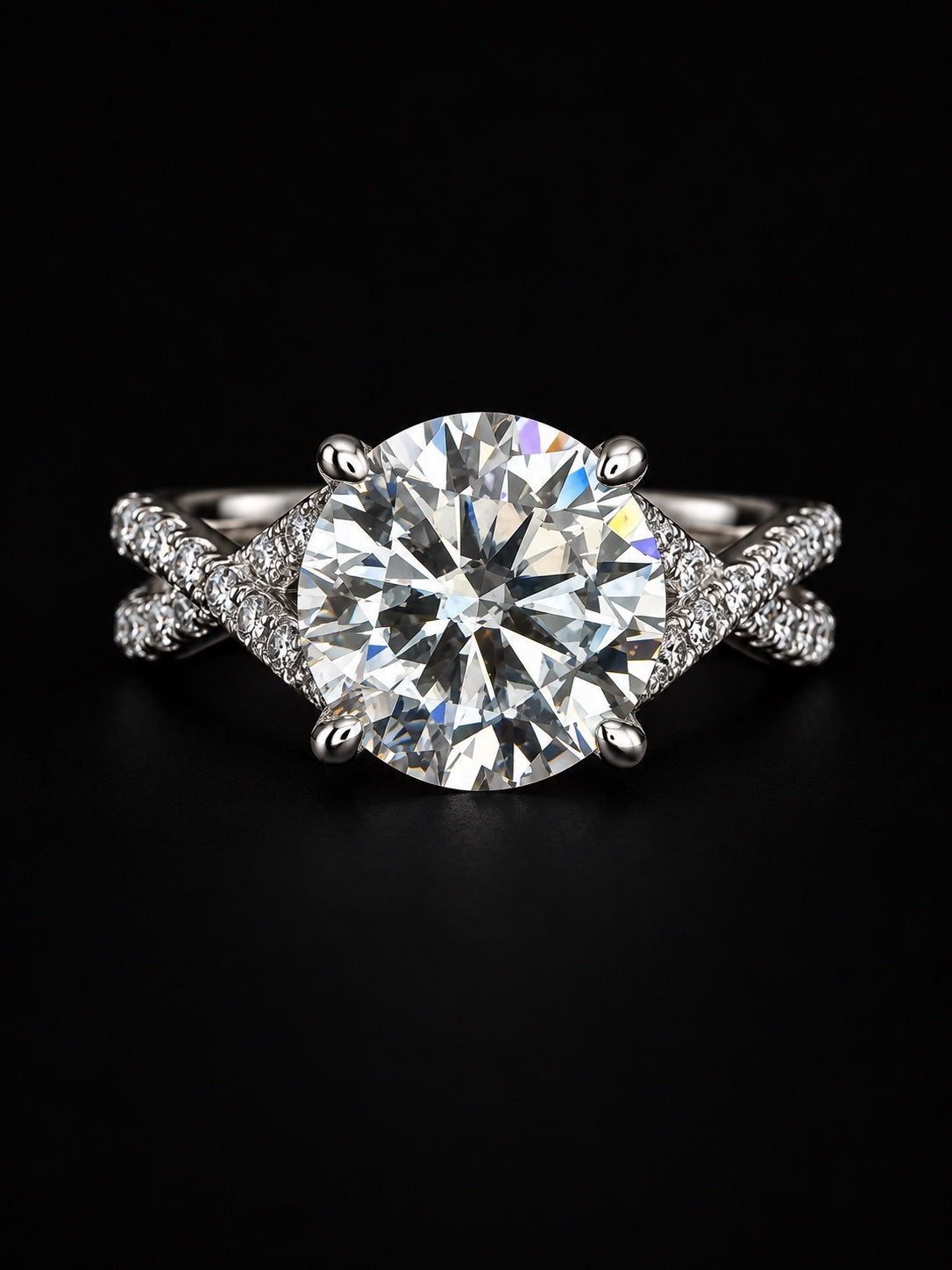Close-up of round lab-grown diamond center stone in four-prong platinum setting