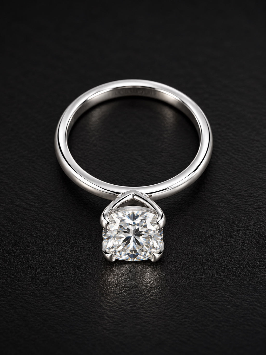Angled view of radiant-cut lab-grown diamond solitaire on a polished platinum band