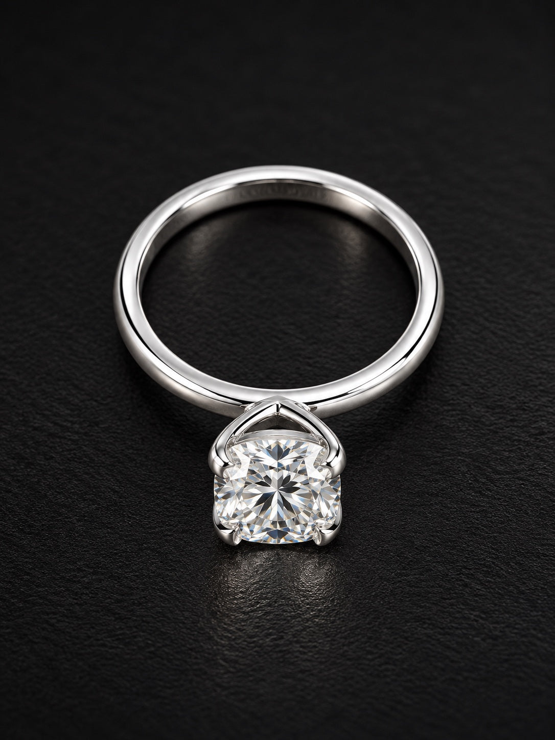 Angled view of radiant-cut lab-grown diamond solitaire on a polished platinum band