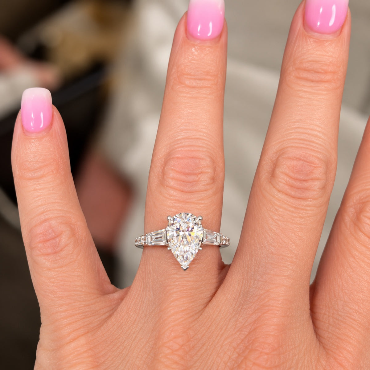 PHNX 2.5 CT lab-grown diamond platinum ring on hand