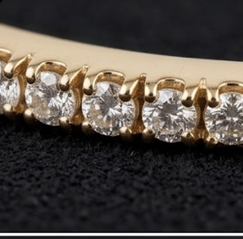 PHNX 14K yellow gold hinged bracelet detail
