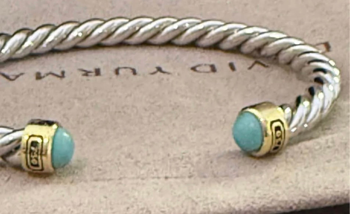 Close-up of David Yurman turquoise cable cuff end caps