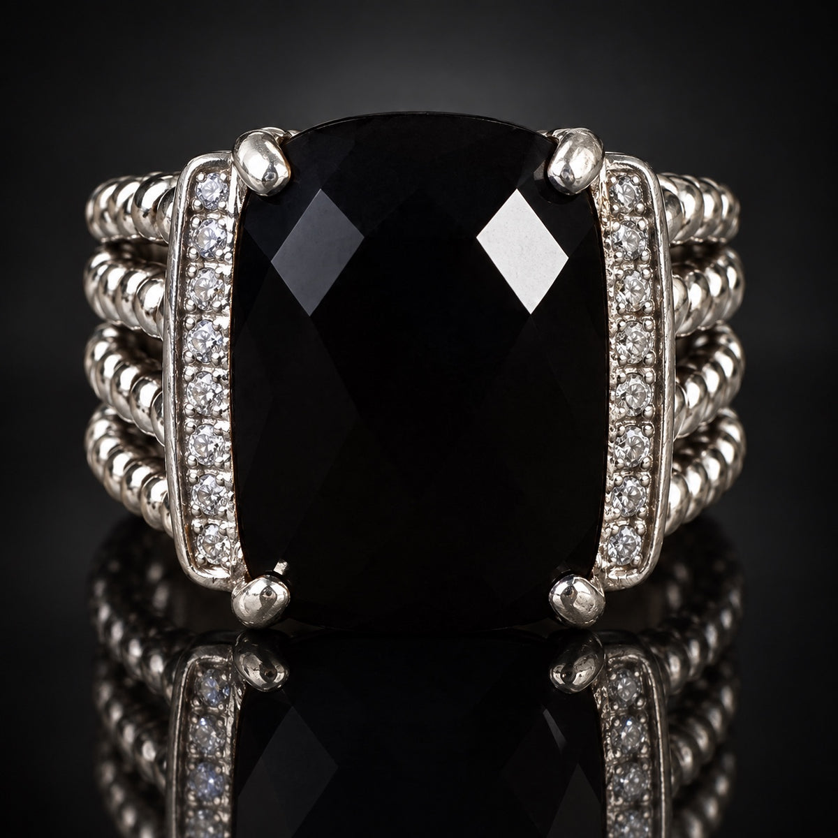 Close-up of David Yurman Wheaton black onyx ring with diamond accents