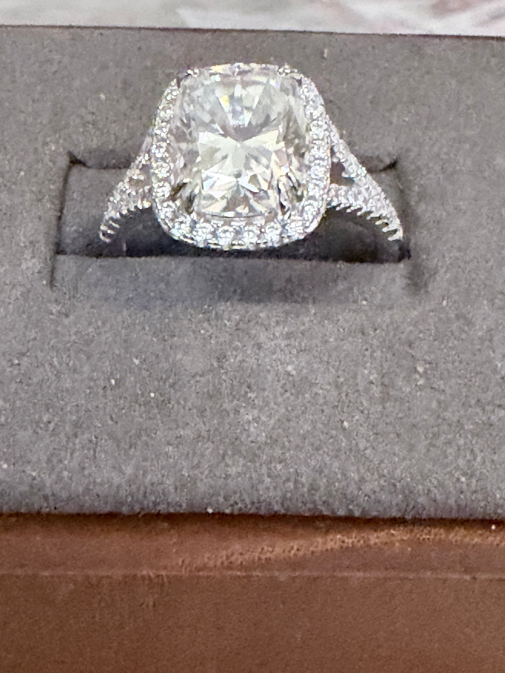 4 ct lab-grown diamond halo ring with platinum setting, angled front view