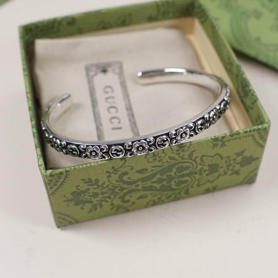 Gucci Interlocking G Flower Cuff Bracelet in Aged Sterling Silver — Medium in Gucci Box
