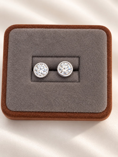 Round lab diamond stud earrings in 14K white gold bezel settings