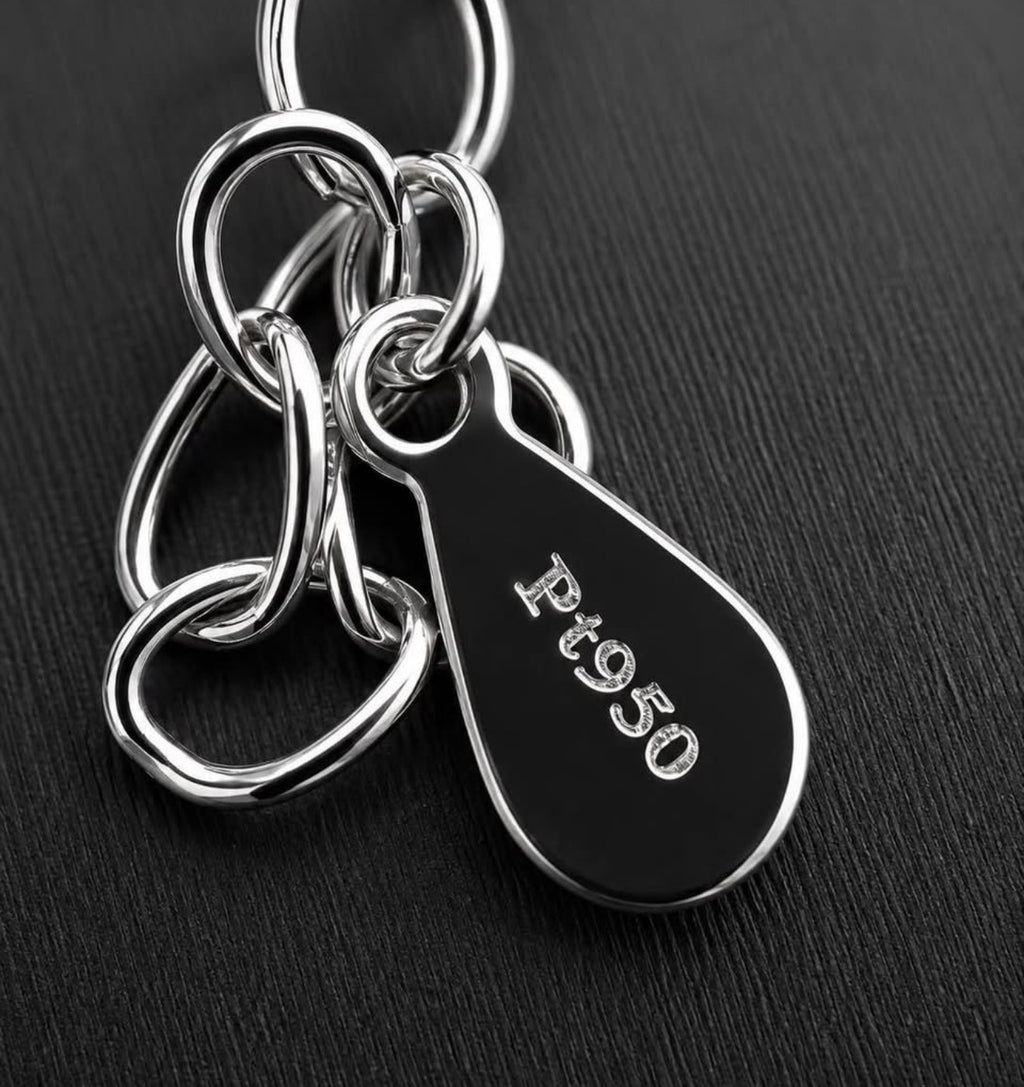 Pt950 platinum hallmark on PHNX necklace tag