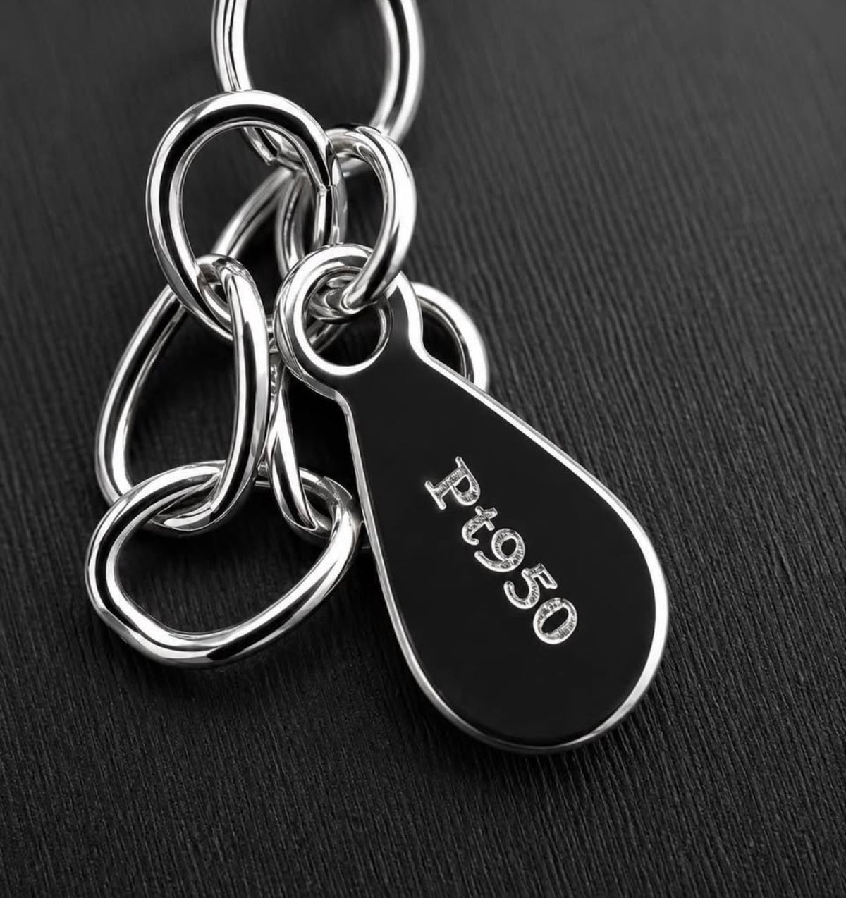 Pt950 platinum hallmark on PHNX necklace tag
