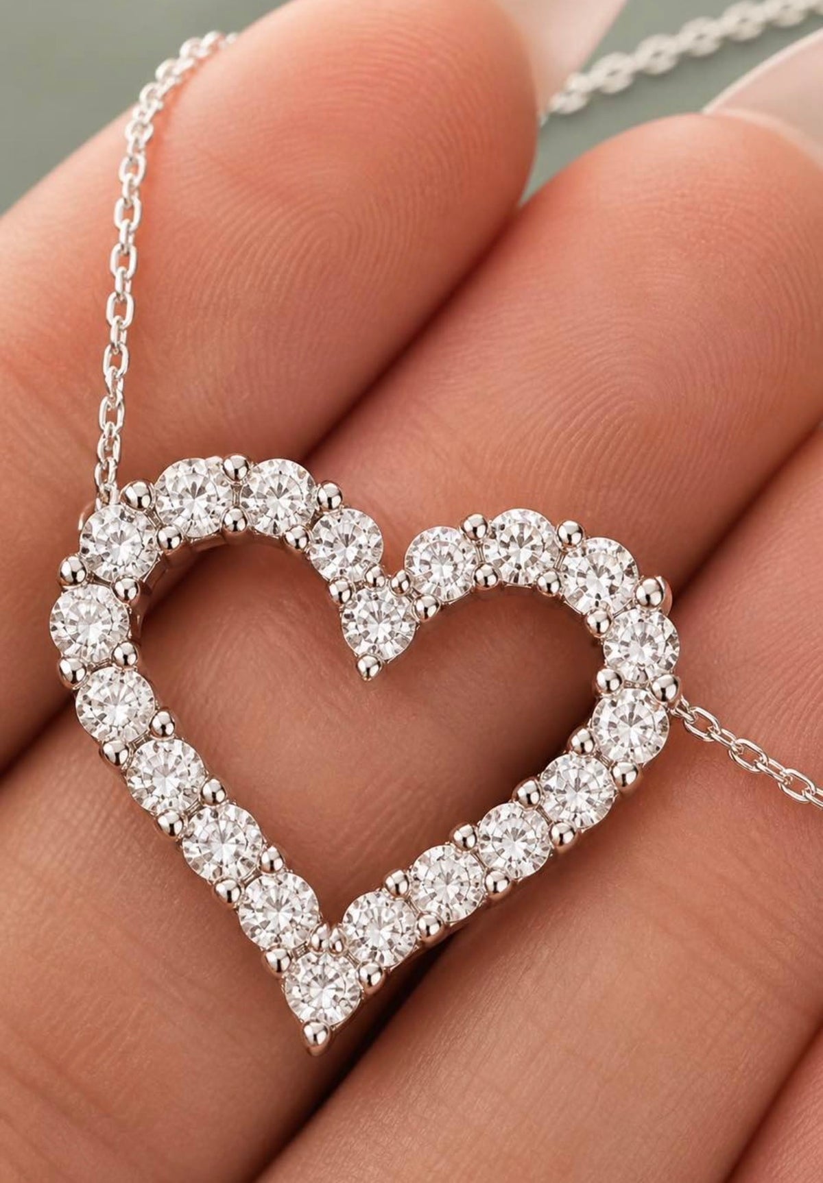 Close-up of PHNX 3 CTW lab-grown diamond open heart necklace