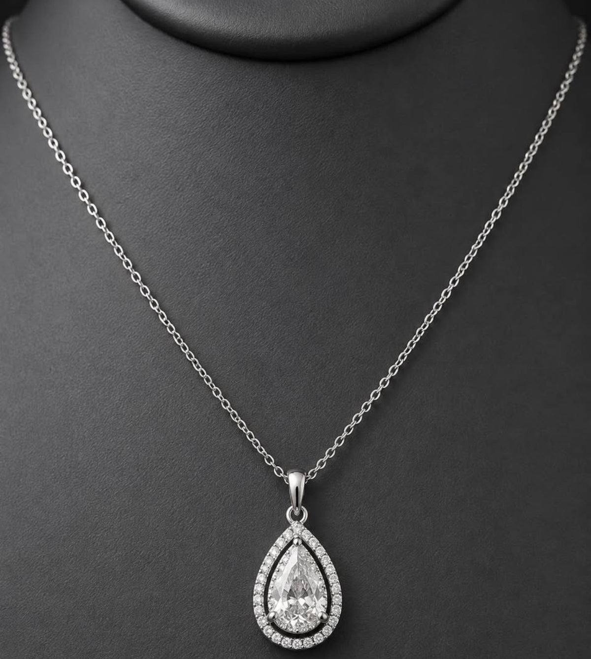 House of PHNX pear lab-grown diamond platinum necklace on black display