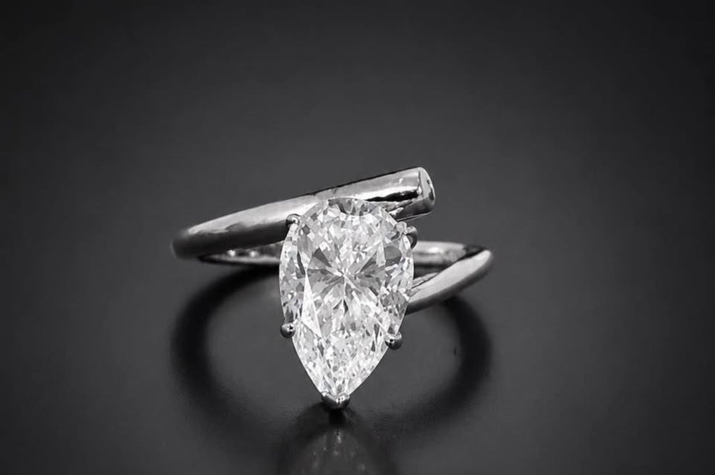 PHNX 4 carat pear-cut platinum ring size 7 angled view