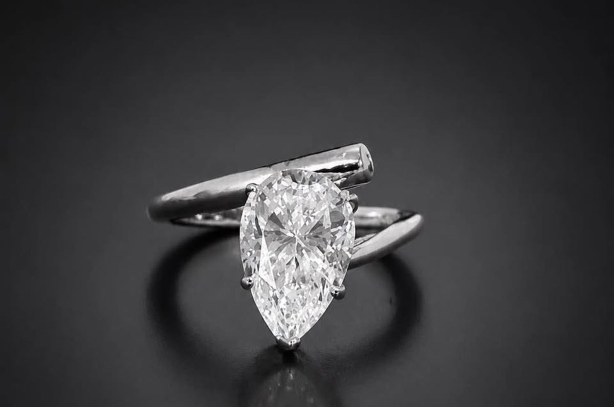 PHNX 4 carat pear-cut platinum ring size 7 angled view