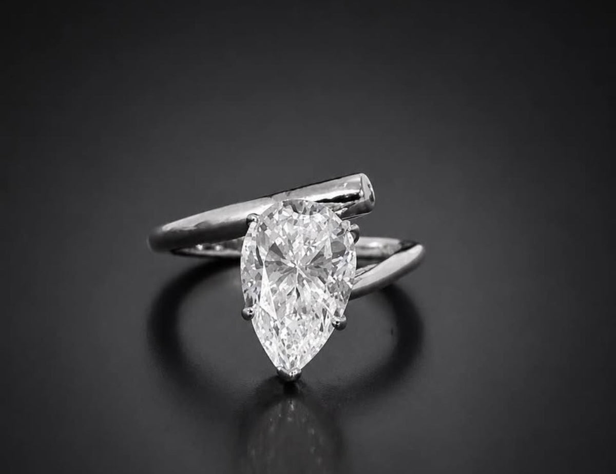 PHNX 4 carat pear-cut platinum ring size 7 front view