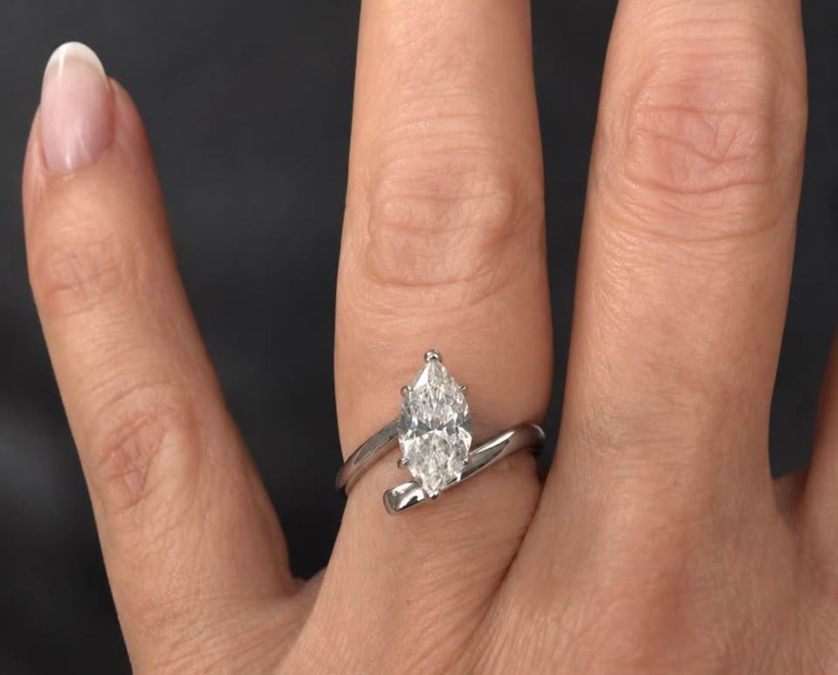PHNX 4 carat pear-cut platinum ring size 7 on hand