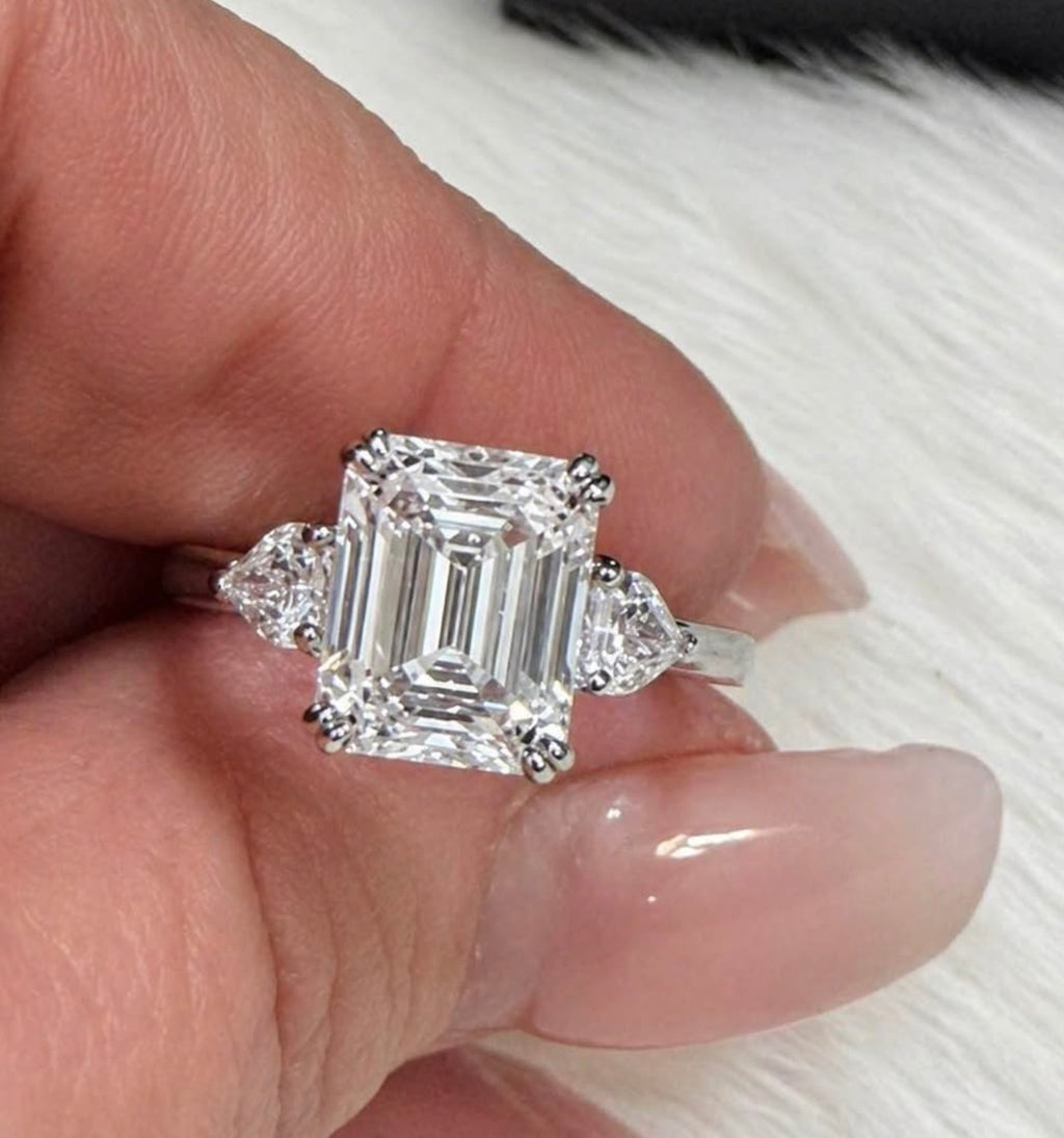 PHNX emerald-cut and pear side lab-grown diamond ring close-up