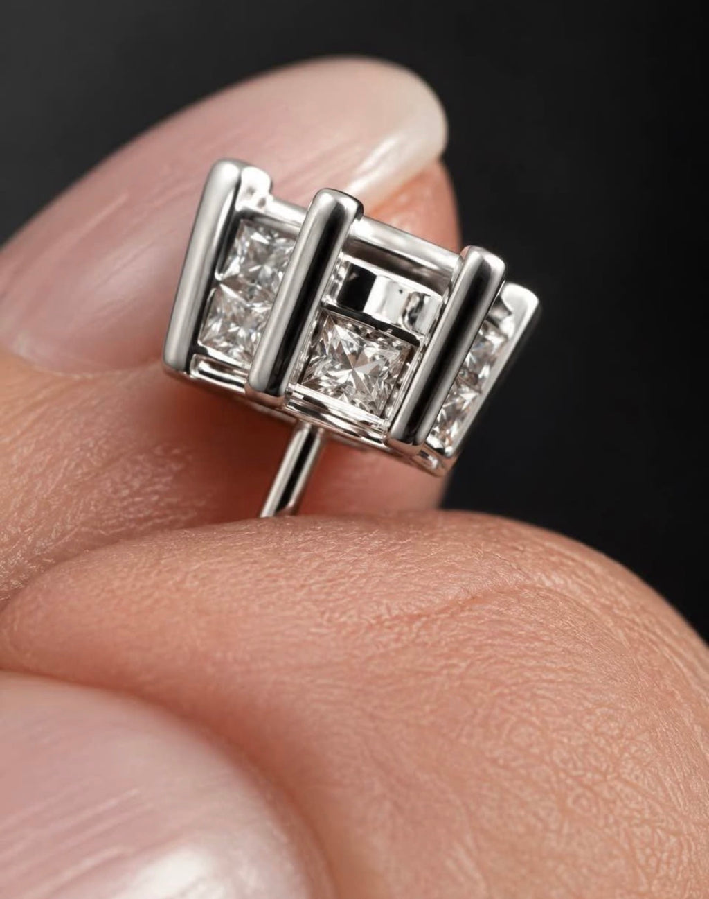 PHNX lab-grown diamond stud earring basket and side stone detail