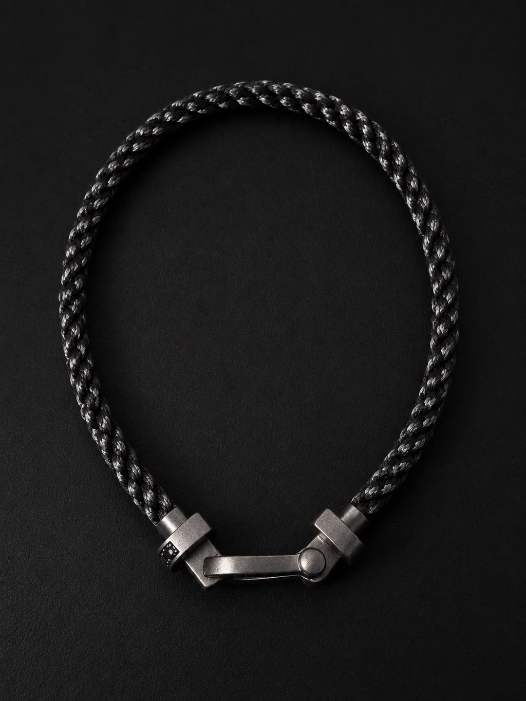 PHNX black cord bracelet full view, 7.5 inches