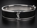 Saint Laurent women's black leather and silver-tone closed cuff bracelet