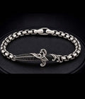 Wave dagger sterling silver bracelet with black diamonds